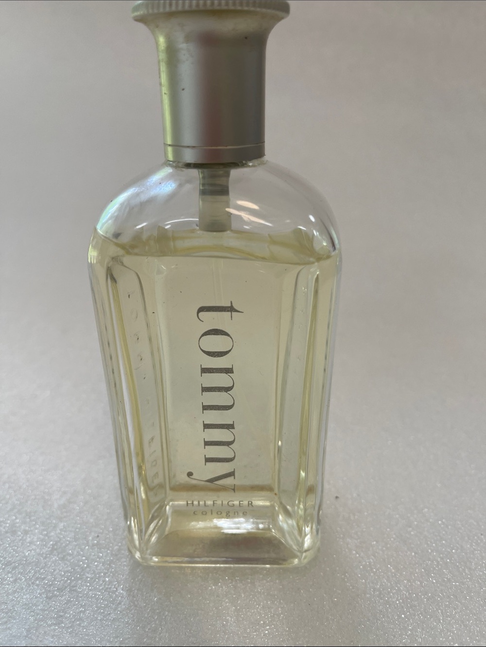 Tommy Hilfiger Clear Glass Bottle with Pale Yellow Cologne